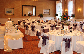Beautifully decorated event with amazing chair covers, flowers and props